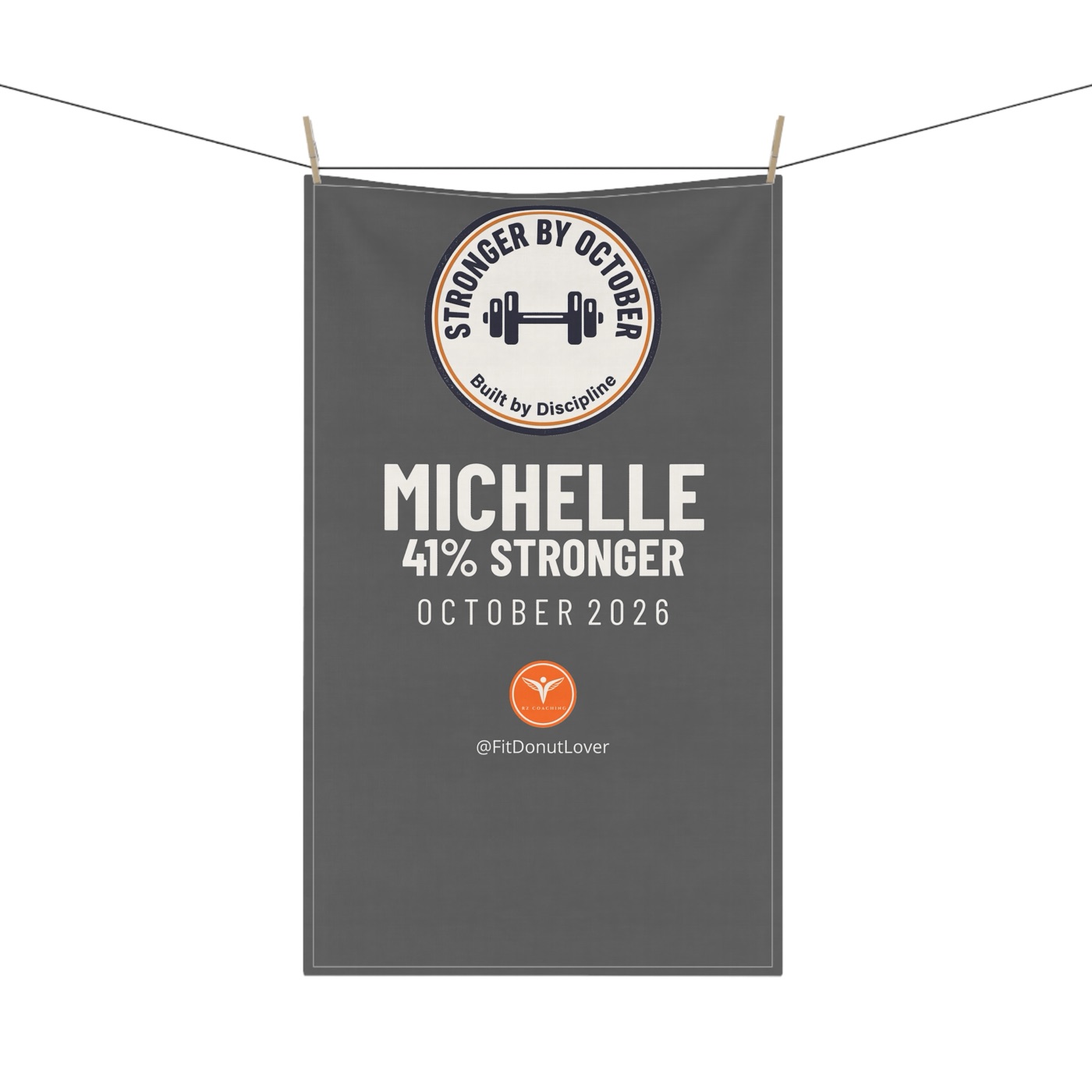 Workout towel printed with a name and strength improvement